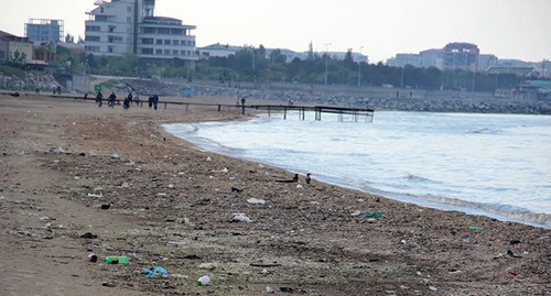 Caspian Sea beach in the town of Kaispiysk. Photo by Akhmed Aldebirov for the ‘Caucasian Knot’. Caspian Sea beach in the town of Kaispiysk. Photo by Akhmed Aldebirov for the ‘Caucasian Knot’.