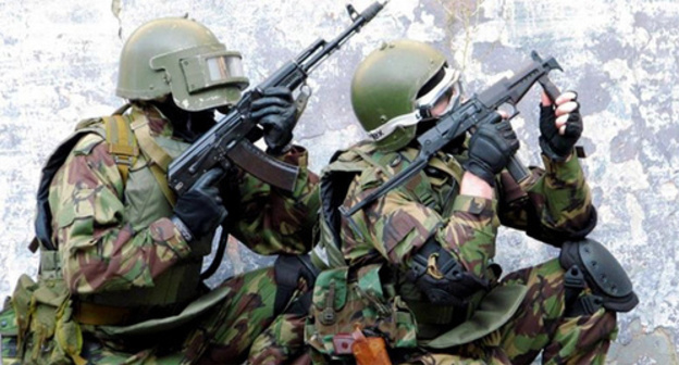 Law enforcers during special operation. Photo: http://nac.gov.ru/nakmessage/2014/07/11/v-khode-spetsoperatsii-v-tsumadinskom-raione-dagestana-neitralizovany-dva-band.html Law enforcers during special operation. Photo: http://nac.gov.ru/nakmessage/2014/07/11/v-khode-spetsoperatsii-v-tsumadinskom-raione-dagestana-neitralizovany-dva-band.html