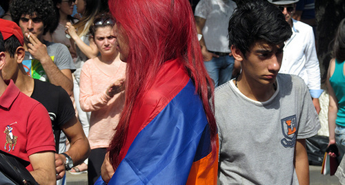 Girl with Armenian flag on her shoulders, protest action against hike in electricity prices, Yerevan, June 24, 2015. Photo by Tigran Petrosyan for the ‘Caucasian Knot’. Girl with Armenian flag on her shoulders, protest action against hike in electricity prices, Yerevan, June 24, 2015. Photo by Tigran Petrosyan for the ‘Caucasian Knot’.