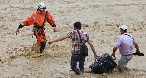 Ministry of Emergencies workers during flooding in Sochi. Photo: http://www.blogsochi.ru/content/navodnenie-v-sochi-glazami-sotrudnikov-mchs Ministry of Emergencies workers during flooding in Sochi. Photo: http://www.blogsochi.ru/content/navodnenie-v-sochi-glazami-sotrudnikov-mchs