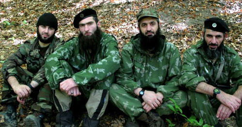 Aslambek Vadalov (second from the right), one of the leaders of "Imarat Kavkaz" which is recognized as a terrorist organization. Photo from a website of "Imarat Kavkaz", recognized as a terrorist organization. Aslambek Vadalov (second from the right), one of the leaders of "Imarat Kavkaz" which is recognized as a terrorist organization. Photo from a website of "Imarat Kavkaz", recognized as a terrorist organization.
