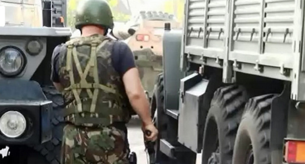 Law enforcer during the special operation in Nalchik. Photo: http://nac.gov.ru/nakmessage/2015/06/27/v-ingushetii-neitralizovany-dvoe-uchastnikov-mezhdunarodnoi-terroristicheskoi-.html Law enforcer during the special operation in Nalchik. Photo: http://nac.gov.ru/nakmessage/2015/06/27/v-ingushetii-neitralizovany-dvoe-uchastnikov-mezhdunarodnoi-terroristicheskoi-.html