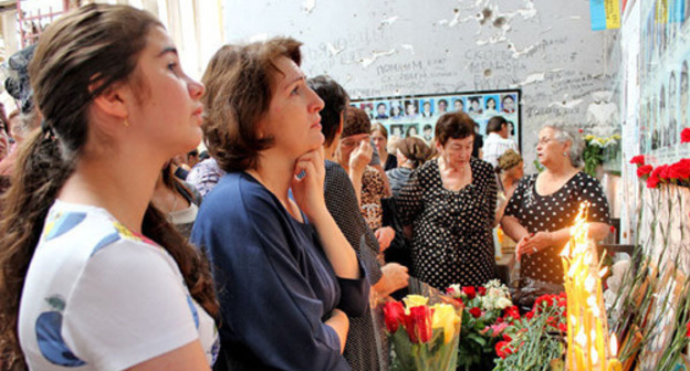 Mourning events dated for the 10th anniversary of the terror act at the Beslan school. North Ossetia - Alania, September 1, 2014. Photo by Emma Marzoeva for the "Caucasian Knot" Mourning events dated for the 10th anniversary of the terror act at the Beslan school. North Ossetia - Alania, September 1, 2014. Photo by Emma Marzoeva for the "Caucasian Knot"