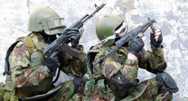 Law enforcers conduct special operation. Photo: http://nac.gov.ru/nakmessage/2014/07/11/v-khode-spetsoperatsii-v-tsumadinskom-raione-dagestana-neitralizovany-dva-band.html Law enforcers conduct special operation. Photo: http://nac.gov.ru/nakmessage/2014/07/11/v-khode-spetsoperatsii-v-tsumadinskom-raione-dagestana-neitralizovany-dva-band.html