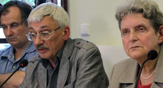Alexander Cherkasov, Oleg Orlov, Svetlana Gannushkina (from left to the right) at the opening of the exhibition "The Never-Ending Story: Violence and Impunity in Northern Caucasus". Moscow, July 15, 2015. Photo by Karina Gadzhieva for the "Caucasian Knot" Alexander Cherkasov, Oleg Orlov, Svetlana Gannushkina (from left to the right) at the opening of the exhibition "The Never-Ending Story: Violence and Impunity in Northern Caucasus". Moscow, July 15, 2015. Photo by Karina Gadzhieva for the "Caucasian Knot"