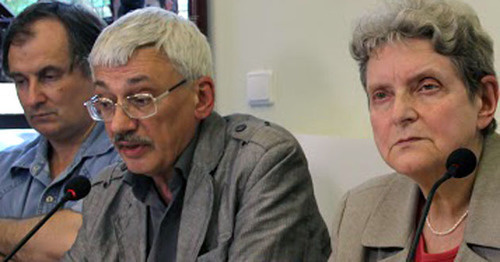 Alexander Cherkasov, Oleg Orlov, Svetlana Gannushkina (from left to the right) at the opening of the exhibition "The Never-Ending Story: Violence and Impunity in Northern Caucasus". Moscow, July 15, 2015. Photo by Karina Gadzhieva for the "Caucasian Knot" Alexander Cherkasov, Oleg Orlov, Svetlana Gannushkina (from left to the right) at the opening of the exhibition "The Never-Ending Story: Violence and Impunity in Northern Caucasus". Moscow, July 15, 2015. Photo by Karina Gadzhieva for the "Caucasian Knot"