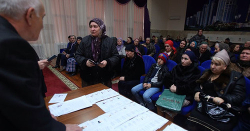 Giving out "genetic passports" to the relatives of the kidnapped residents of Chechnya. Grozny, March 2015. Photo by Kazbek Vakhaev http://www.grozny-inform.ru/news/society/58610/ Giving out "genetic passports" to the relatives of the kidnapped residents of Chechnya. Grozny, March 2015. Photo by Kazbek Vakhaev http://www.grozny-inform.ru/news/society/58610/