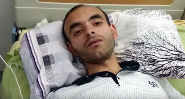 Rasim Aliev in hospital, August 8, 2015. Screenshot from video, MOV 0003, https://www.youtube.com/watch?t=10&v=wigU5a7vRHM Rasim Aliev in hospital, August 8, 2015. Screenshot from video, MOV 0003, https://www.youtube.com/watch?t=10&v=wigU5a7vRHM