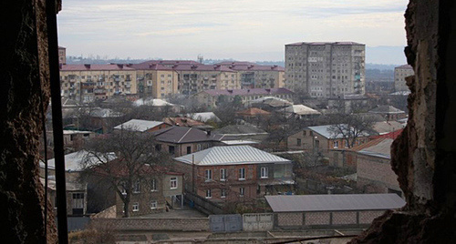 View of Tskhinvali from the window of a demolished flat on a 7th floor, December 2013. Photo by Mariya Kotaeva for the "Caucasian Knot" View of Tskhinvali from the window of a demolished flat on a 7th floor, December 2013. Photo by Mariya Kotaeva for the "Caucasian Knot"