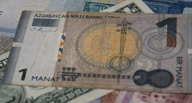 Azerbaijani manat and foreign currencies. Photo by Magomed Magomedov Azerbaijani manat and foreign currencies. Photo by Magomed Magomedov