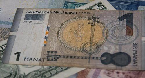 Azerbaijani manat and foreign currencies. Photo by Magomed Magomedov Azerbaijani manat and foreign currencies. Photo by Magomed Magomedov