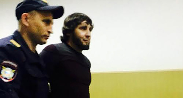 Dadaev convoyed to the courtroom. Photo by Yuliya Buslavskaya for the "Caucasian Knot" Dadaev convoyed to the courtroom. Photo by Yuliya Buslavskaya for the "Caucasian Knot"