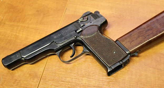 A 9 mm Stechkin automatic pistol. Photo: Vitaly V. Kuzmin, https://ru.wikipedia.org/wiki/Автоматический_пистолет_Стечкина#/media/File:Stechkin_APS.jpg A 9 mm Stechkin automatic pistol. Photo: Vitaly V. Kuzmin, https://ru.wikipedia.org/wiki/Автоматический_пистолет_Стечкина#/media/File:Stechkin_APS.jpg