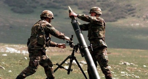 Soldiers on the front line prepare a 82-mm mortar for the shelling. Photo: http://haqqin.az/news/51482 Soldiers on the front line prepare a 82-mm mortar for the shelling. Photo: http://haqqin.az/news/51482