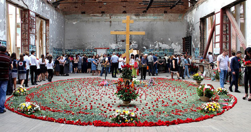 Communion Service in the gym of School No. 1 in Beslan. Photo by Emma Marzoeva. Communion Service in the gym of School No. 1 in Beslan. Photo by Emma Marzoeva.