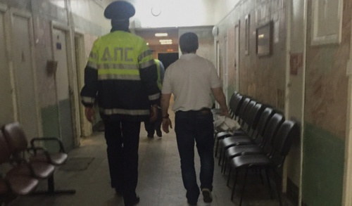 Khadjimurat Temurziev is led to the courtroom. Moscow, August 28, 2015. Photo by Mikail Kostoev for the "Caucasian Knot" Khadjimurat Temurziev is led to the courtroom. Moscow, August 28, 2015. Photo by Mikail Kostoev for the "Caucasian Knot"