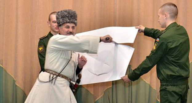 The presentation of the program "Circassian sabre" (the art of wielding Circassian bladed weapons)
performed by Felix Nakov, Director General of the National Museum of KBR. Photo: http://www.cmaf.ru/news/news-990/ The presentation of the program "Circassian sabre" (the art of wielding Circassian bladed weapons)
performed by Felix Nakov, Director General of the National Museum of KBR. Photo: http://www.cmaf.ru/news/news-990/