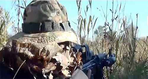 Special service officer during special operation. Photo: http://nac.gov.ru/nakmessage/2015/10/20/v-dagestane-v-khode-kto-neitralizovany-chetvero-banditov.html Special service officer during special operation. Photo: http://nac.gov.ru/nakmessage/2015/10/20/v-dagestane-v-khode-kto-neitralizovany-chetvero-banditov.html