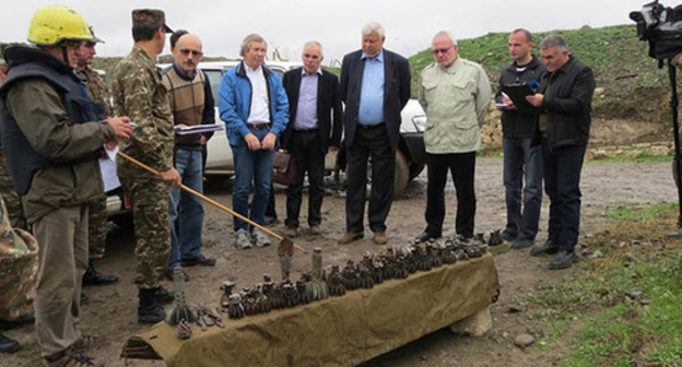 Prior to OSCE monitoring at the contact line, the Defence Army of Nagorno-Karabakh has presented to co-Chairs of the OSCE Minsk Group parts of unexploded shells of heavy artillery. According to the Defence Army of Nagorno-Karabakh, the Azerbaijani armed forces used them to shell the Karabakh territory, October 27, 2015. Photo by Alvard Grigoryan for the ‘Caucasian Knot’. Prior to OSCE monitoring at the contact line, the Defence Army of Nagorno-Karabakh has presented to co-Chairs of the OSCE Minsk Group parts of unexploded shells of heavy artillery. According to the Defence Army of Nagorno-Karabakh, the Azerbaijani armed forces used them to shell the Karabakh territory, October 27, 2015. Photo by Alvard Grigoryan for the ‘Caucasian Knot’.