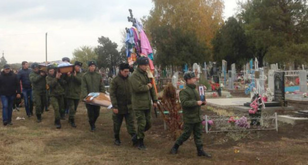 Burial of Vadim Kostenko. Photo: Sergey Khazov-Kassiya,  RFE/ RL, http://www.svoboda.org/content/article/27332224.html