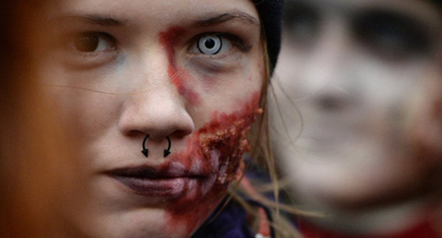 Young woman in Halloween makeup. Photo: Sputnik/ Alexander Kryazhev, http://sputnik-georgia.ru/religion/20151028/228930078.html