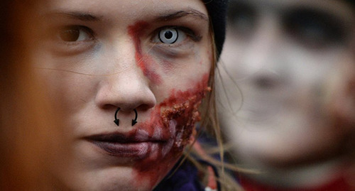 Young woman in Halloween makeup. Photo: Sputnik/ Alexander Kryazhev, http://sputnik-georgia.ru/religion/20151028/228930078.html