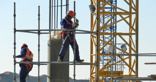 Workers at the building site of ‘Volgograd Arena’ Stadium. Photo by Tatiana Filimonova for the ‘Caucasian Knot’. Workers at the building site of ‘Volgograd Arena’ Stadium. Photo by Tatiana Filimonova for the ‘Caucasian Knot’.