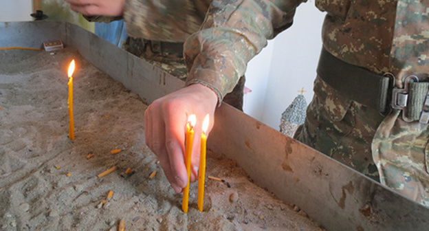 Candles in the Church of the Nagorno-Karabakh Defense Army. Photo by Alvard Grigoryan for the ‘Caucasian Knot’. Candles in the Church of the Nagorno-Karabakh Defense Army. Photo by Alvard Grigoryan for the ‘Caucasian Knot’.