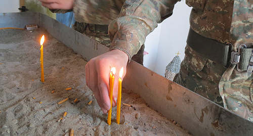 Candles in the Church of the Nagorno-Karabakh Defense Army. Photo by Alvard Grigoryan for the ‘Caucasian Knot’. Candles in the Church of the Nagorno-Karabakh Defense Army. Photo by Alvard Grigoryan for the ‘Caucasian Knot’.