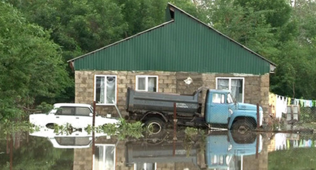 A house affected by flooding. Adygea, May 25, 2015. Photo https://mvd.ru/news/item/1060861/ A house affected by flooding. Adygea, May 25, 2015. Photo https://mvd.ru/news/item/1060861/