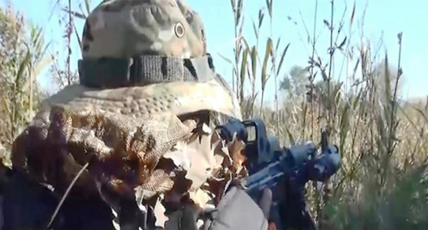Law enforcer during special operation. Photo: http://nac.gov.ru/nakmessage/2015/10/20/v-dagestane-v-khode-kto-neitralizovany-chetvero-banditov.html Law enforcer during special operation. Photo: http://nac.gov.ru/nakmessage/2015/10/20/v-dagestane-v-khode-kto-neitralizovany-chetvero-banditov.html