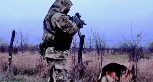 Law enforcer during special operation. Photo: http://nac.gov.ru