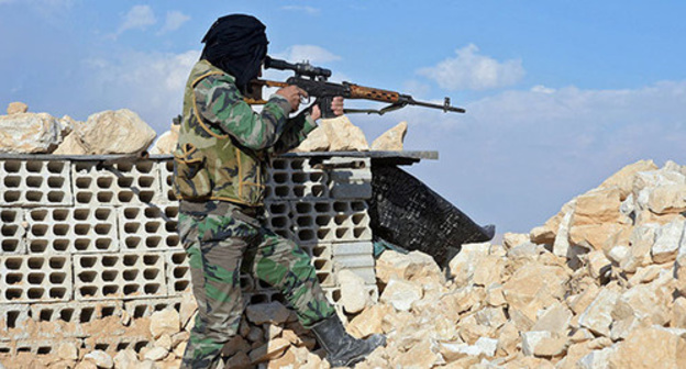 Combatant in Syria. Photo: Sputnik/ Mikhail Voskresensky, http://www.sputnikarmenia.ru/world/20151113/1084027.html Combatant in Syria. Photo: Sputnik/ Mikhail Voskresensky, http://www.sputnikarmenia.ru/world/20151113/1084027.html