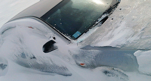 Car in snow captivity. Photo: © Sputnik/ Artur Gutman, http://sputnik.co.am/armenia/20160105/1574448.html Car in snow captivity. Photo: © Sputnik/ Artur Gutman, http://sputnik.co.am/armenia/20160105/1574448.html