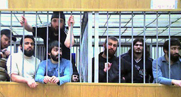 The convicts in the case of the attack on Nalchik on October 13, 2005, at one of the court sessions. Kabardino-Balkaria, Nalchik, 2011. Photo courtesy of Maryam Akhmetova, an activist of the movement "Mothers of Kabardino-Balkaria for Protection of Citizens' Rights and Freedoms" The convicts in the case of the attack on Nalchik on October 13, 2005, at one of the court sessions. Kabardino-Balkaria, Nalchik, 2011. Photo courtesy of Maryam Akhmetova, an activist of the movement "Mothers of Kabardino-Balkaria for Protection of Citizens' Rights and Freedoms"