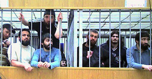 The convicts in the case of the attack on Nalchik on October 13, 2005, at one of the court sessions. Kabardino-Balkaria, Nalchik, 2011. Photo courtesy of Maryam Akhmetova, an activist of the movement "Mothers of Kabardino-Balkaria for Protection of Citizens' Rights and Freedoms" The convicts in the case of the attack on Nalchik on October 13, 2005, at one of the court sessions. Kabardino-Balkaria, Nalchik, 2011. Photo courtesy of Maryam Akhmetova, an activist of the movement "Mothers of Kabardino-Balkaria for Protection of Citizens' Rights and Freedoms"