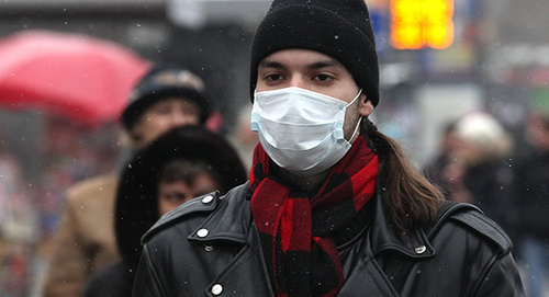 A young man in a surgical mask. Photo: Sputnik/ Yevgeny Biyatov, http://sputnik-georgia.ru/society/20160127/229923227.html A young man in a surgical mask. Photo: Sputnik/ Yevgeny Biyatov, http://sputnik-georgia.ru/society/20160127/229923227.html