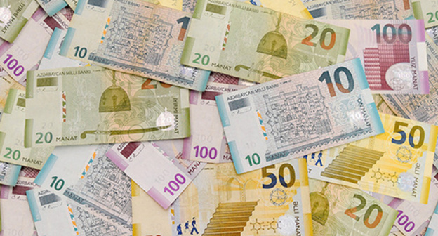 Different denomination of manat banknotes. Photo: © Sputnik/ Murad Orujov. http://sputnik.az/economy/20160128/403527074.html
