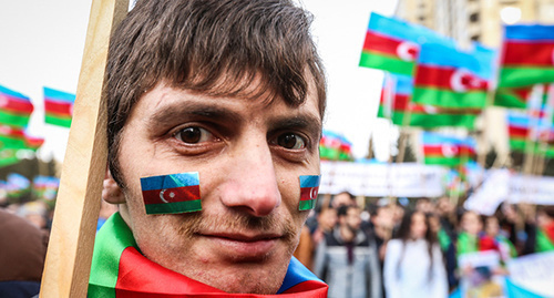 The participant of the anti-crisis rally in Baku. March 15, 2015. Photo by Aziz Karimov for the "Caucasian Knot" The participant of the anti-crisis rally in Baku. March 15, 2015. Photo by Aziz Karimov for the "Caucasian Knot"