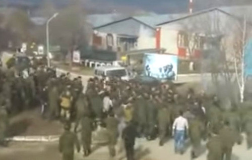 A fight in the territory of a military unit in the village of Borzoi. February 25, 2016. Screenshot of a video by the user Nadezhda Ivanova https://www.youtube.com/watch?v=2R9tW9YkqbE&amp;feature=youtu.be