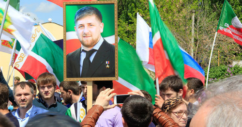 Rally participants hold Kadyrov’s portrait, Grozny, May 1, 2015. Photo by Magomed Megomedov for the ‘Caucasian Knot’ Rally participants hold Kadyrov’s portrait, Grozny, May 1, 2015. Photo by Magomed Megomedov for the ‘Caucasian Knot’