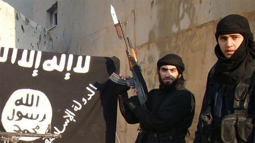 IS supporters near the "Islamic State" flag (Islamic State is a terrorist organization banned in Russia). Photo by user Vesti Detalno, www.flickr.com IS supporters near the "Islamic State" flag (Islamic State is a terrorist organization banned in Russia). Photo by user Vesti Detalno, www.flickr.com