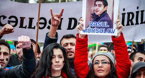Rally participant holds portrait of political prisoner, Baku, March 125, 2015. Photo by Aziz Karimov for the ‘Caucasian Knot’. Rally participant holds portrait of political prisoner, Baku, March 125, 2015. Photo by Aziz Karimov for the ‘Caucasian Knot’.