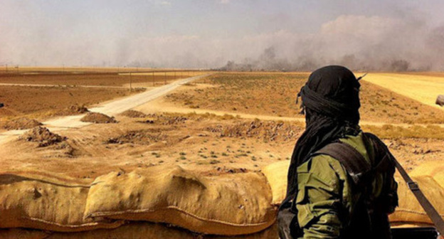 War in Syria. Photo: Kurdish YPG Fighter https://www.flickr.com War in Syria. Photo: Kurdish YPG Fighter https://www.flickr.com