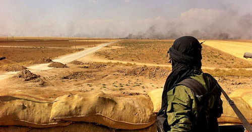 War in Syria. Photo: Kurdish YPG Fighter https://www.flickr.com War in Syria. Photo: Kurdish YPG Fighter https://www.flickr.com