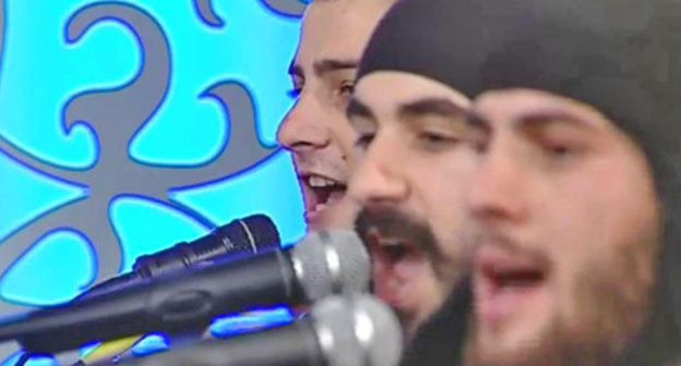 The performance of Georgian ensemble "Bani". Screenshot of a video by the user MrDc120mm https://www.youtube.com/watch?v=SZ5XAFYlg1k The performance of Georgian ensemble "Bani". Screenshot of a video by the user MrDc120mm https://www.youtube.com/watch?v=SZ5XAFYlg1k