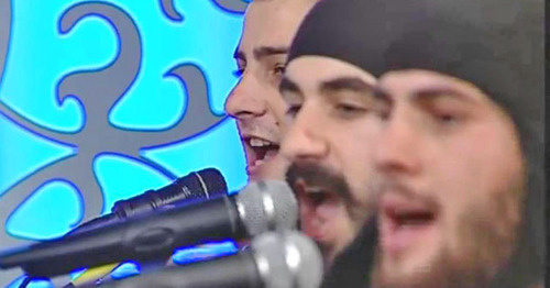 The performance of Georgian ensemble "Bani". Screenshot of a video by the user MrDc120mm https://www.youtube.com/watch?v=SZ5XAFYlg1k The performance of Georgian ensemble "Bani". Screenshot of a video by the user MrDc120mm https://www.youtube.com/watch?v=SZ5XAFYlg1k