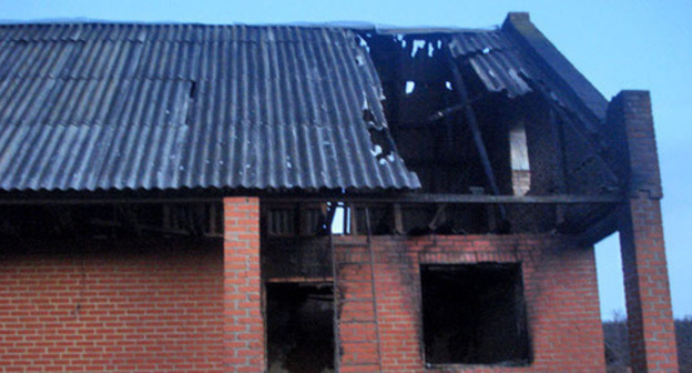 Burned down houses belonged to relatives of militants killed in Grozny on December 4, Andi village, Achkhoi-Martan District, December 7,2014. Photo by ‘Memorial’ Human Rights Centre press-service. Burned down houses belonged to relatives of militants killed in Grozny on December 4, Andi village, Achkhoi-Martan District, December 7,2014. Photo by ‘Memorial’ Human Rights Centre press-service.