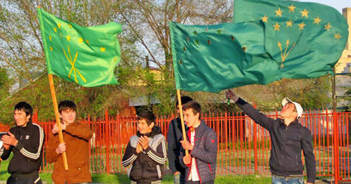 Young people holding flags of flag of Karachay–Cherkessia. April 25, 2014. Photo by Asya Kapaeva for the "Caucasian Knot" Young people holding flags of flag of Karachay–Cherkessia. April 25, 2014. Photo by Asya Kapaeva for the "Caucasian Knot"