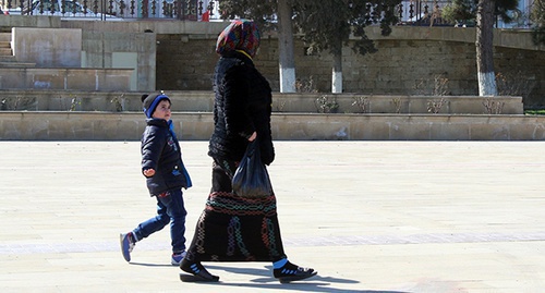 Woman in a headscarf with a child, Derbent, March 2015. Photo by the ‘Caucasian Knot’ correspondent Patimat Makhmudova. Woman in a headscarf with a child, Derbent, March 2015. Photo by the ‘Caucasian Knot’ correspondent Patimat Makhmudova.
